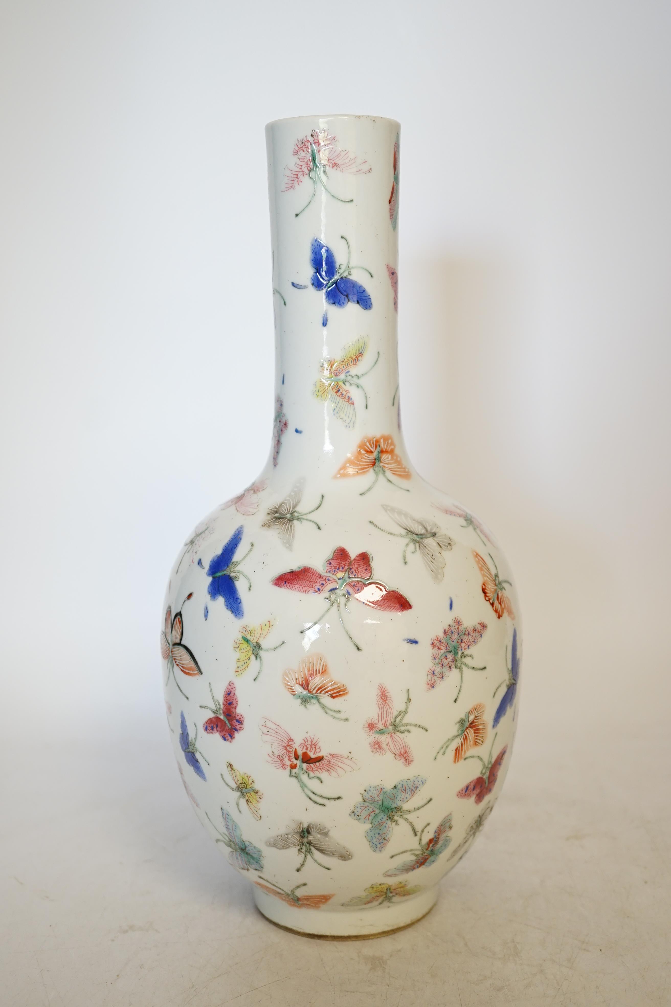 A Chinese famille rose ‘butterflies’ vase, 29cm high. Condition - good